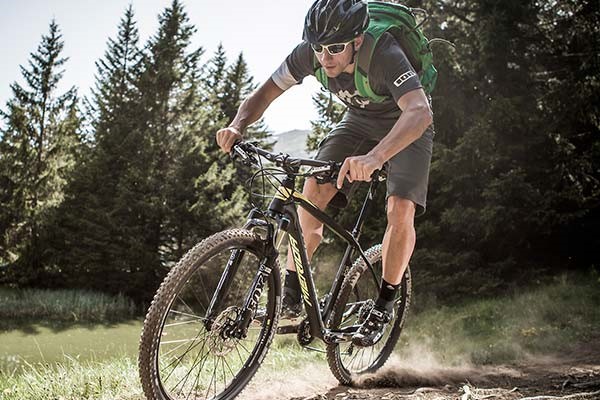 Mountain biker trail riding on a hardtail MTB