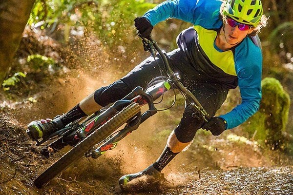 mountain biker shredding a turn