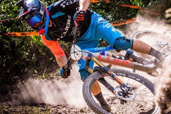 Cube Enduro MTB racer shredding a turn