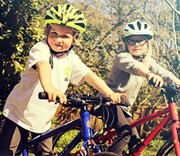 kids riding frog bikes