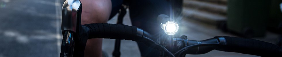 Cyclist with front bike light