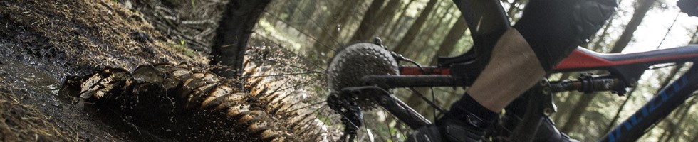 Mountain biking in the mud with a mudguard