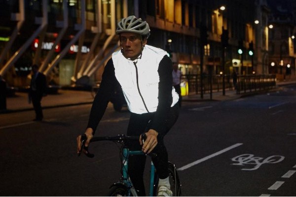 A reflective gilet worn over a non-reflective jacket helps make the cyclist much more visible