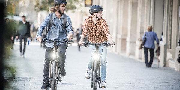 Cyclists riding through a city