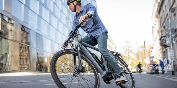 Commuter using an electric bike