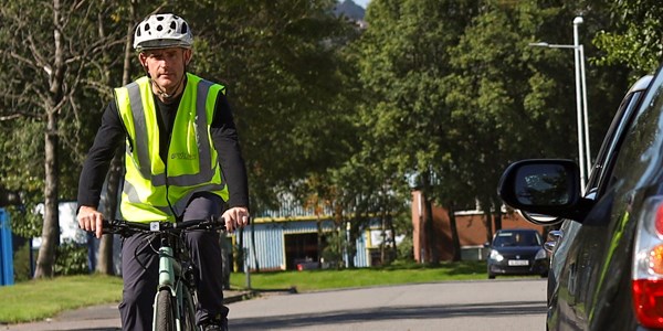 Cyclist riding safely on the road