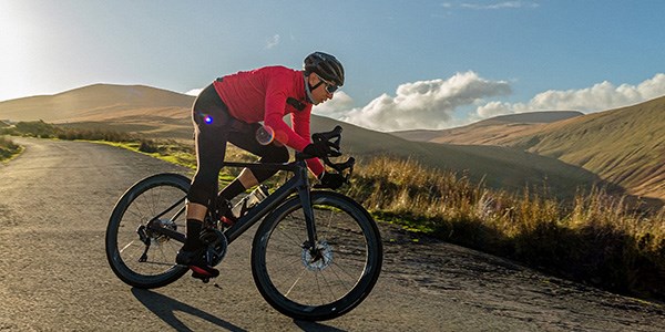 road cyclist on a crisp sunny day in teh welsh mountains
