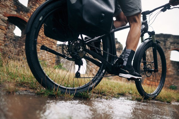 cycling past a puddle