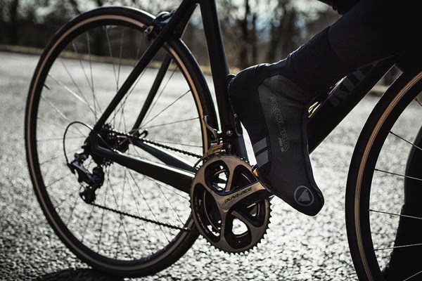 cycling on a wet road detail