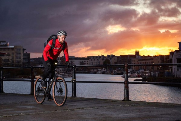 Commuter cyclist at sunset