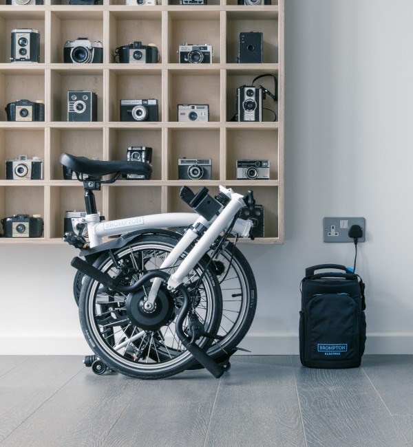 Brompton Electric bike folded with battery charging