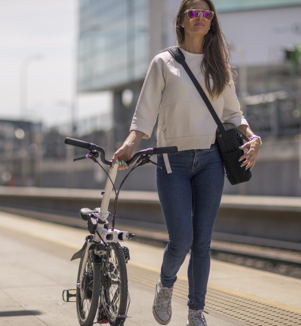 Wheeling a folded Brompton electric bike