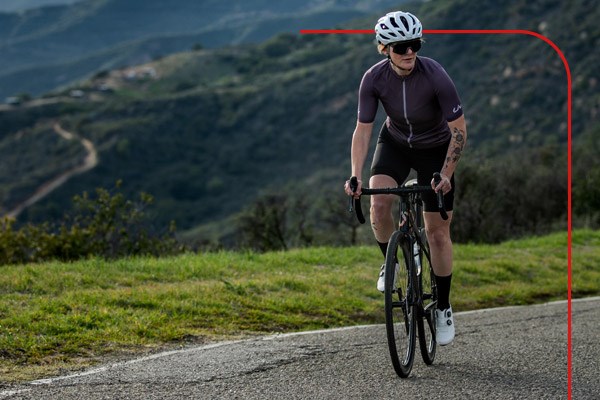 A road cyclist on a Liv Avail Advanced Pro 1