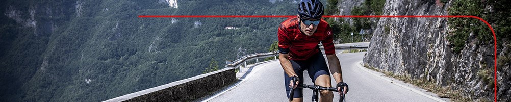 Road cyclists wearing castelli jerseys