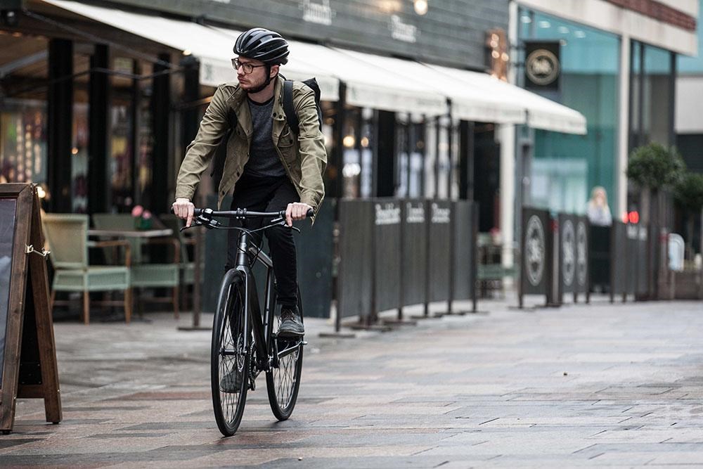 commuter riding through city