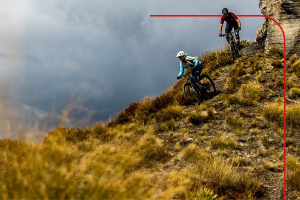 Mountain bikers on the crest of a hill