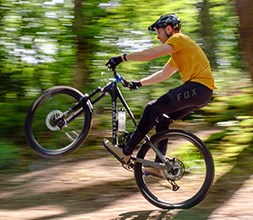 fast mountain bike manual in the woods